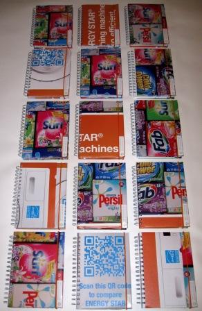 Recycled notebooks made from EECA's Adshel posters.